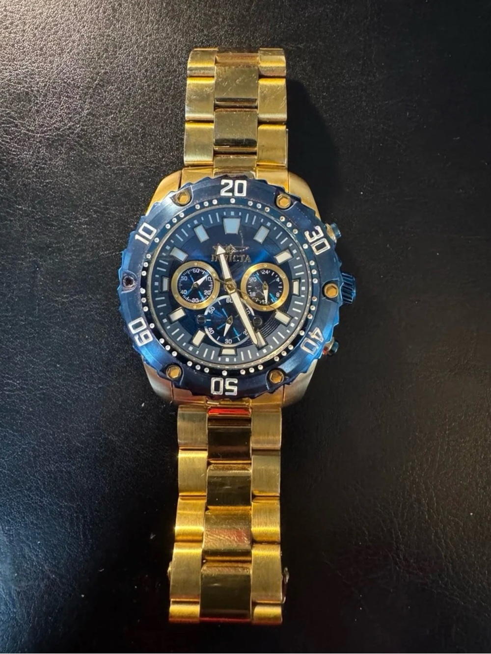 Invicta Gold Tone Bracelet Watch with Blue Dial and Bezel